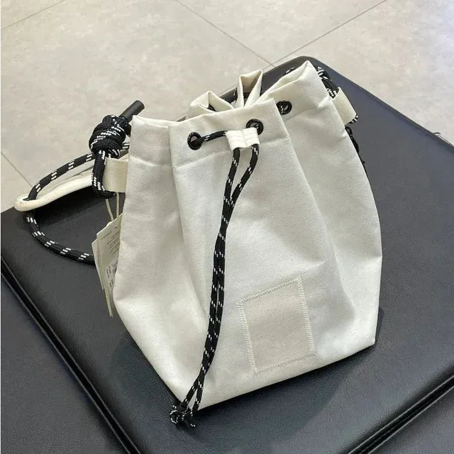 UAKISS  -  2024 Portable Simple Drawstring Handbags Japanese Trendy Women's Crossbody Canvas Bag Casual Travel Mini  Bags Y2k Aesthetic