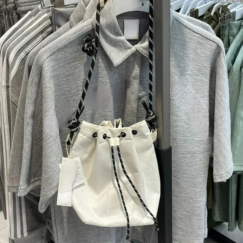 UAKISS  -  2024 Portable Simple Drawstring Handbags Japanese Trendy Women's Crossbody Canvas Bag Casual Travel Mini  Bags Y2k Aesthetic